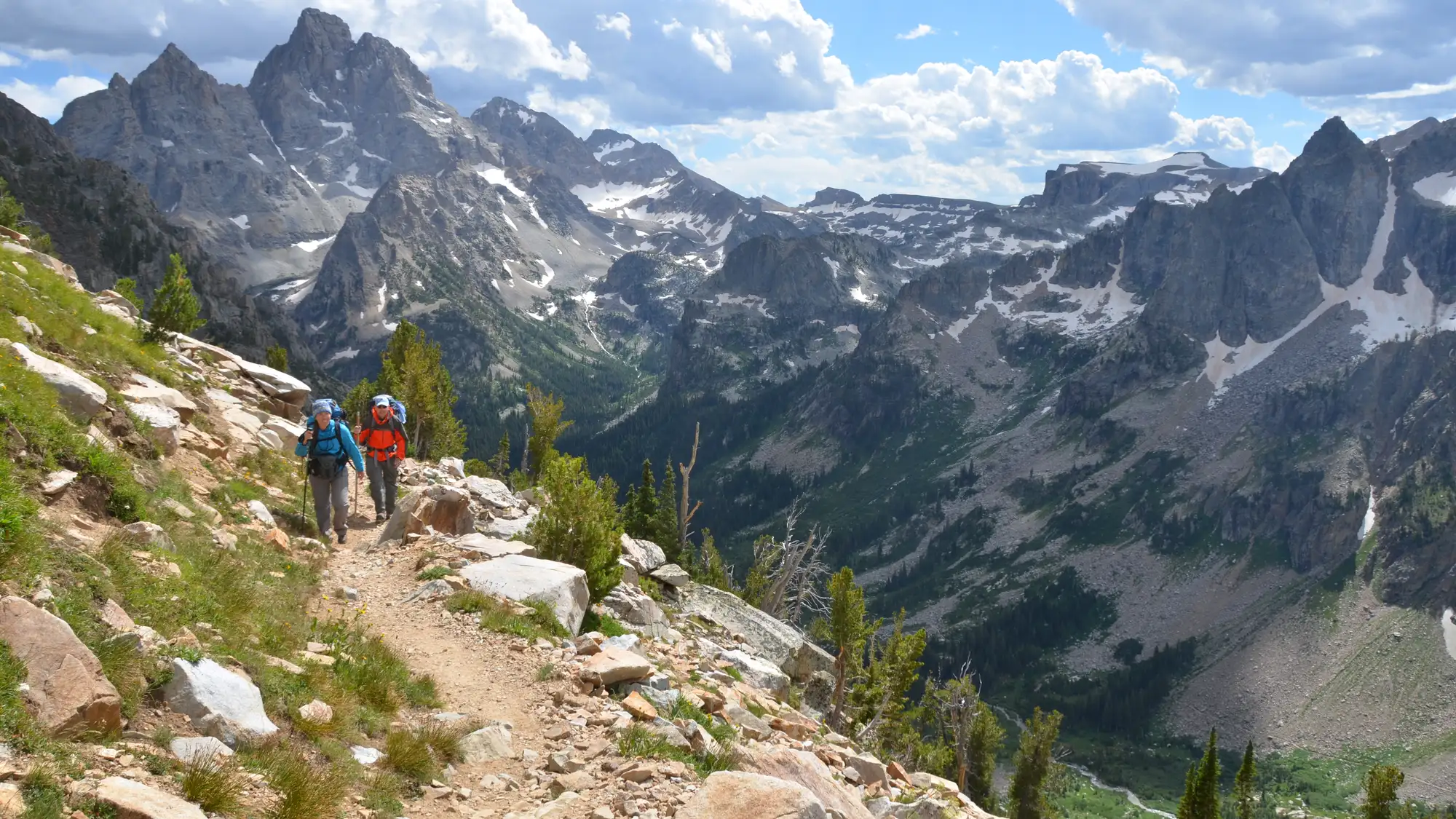 Backpackers in North Fork Cascade Canyon, Grand Teton behind