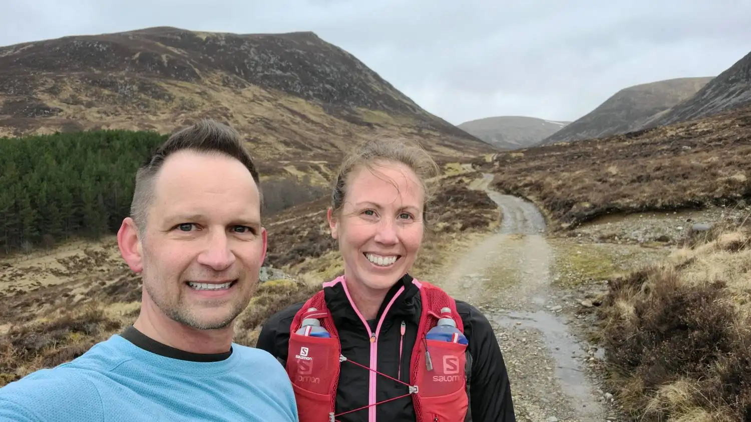 Ashley and Andrew on a trail-running path through the Scottish Highlands